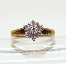 A 9ct gold snowflake ring set with diamond accents, size R1/2, weight 3.2gms Condition Report: