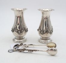 A pair of Edwardian silver specimen vases, by Holland, Aldwinckle & Slater, London 1901, of baluster