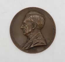 A bronze presentation medal cast "Gustavus Forssell Praeses Conventus Radiologorum Internationalis