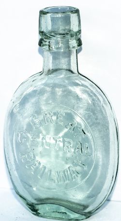 Great Central Railway glass whisky flask. Aqua coloured glass with a pressed lip in excellent