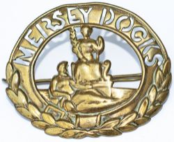 MERSEY DOCKS original brass cap badge complete with clip. Measures 2.75in x 2in. From the Mersey
