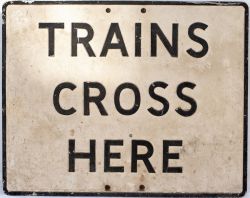 Road sign TRAINS CROSS HERE. Rectangular cast aluminium in original condition complete with both