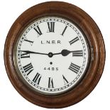 North Eastern Railway 12in dial oak cased railway clock with a spun brass bezel and a chain driven