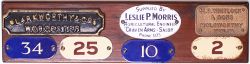 A board with 3 Agricultural plates attached and 4 enamel Number plates attached, two of which appear