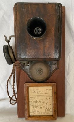 Early Signalbox Telephone with separate mouthpiece and headphone, mounted on the original backing
