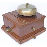Tyers mahogany cased split cased Block Bell with front tapper and large mushroom bell. In very