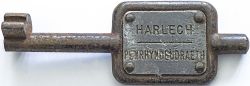 GWR Tyers No9 single line steel key token HARLECH - PENRHYNDEUDRAETH, configuration A. In ex railway