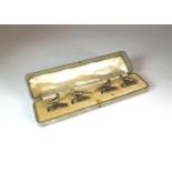A cased set of George V silver mounted menu holders