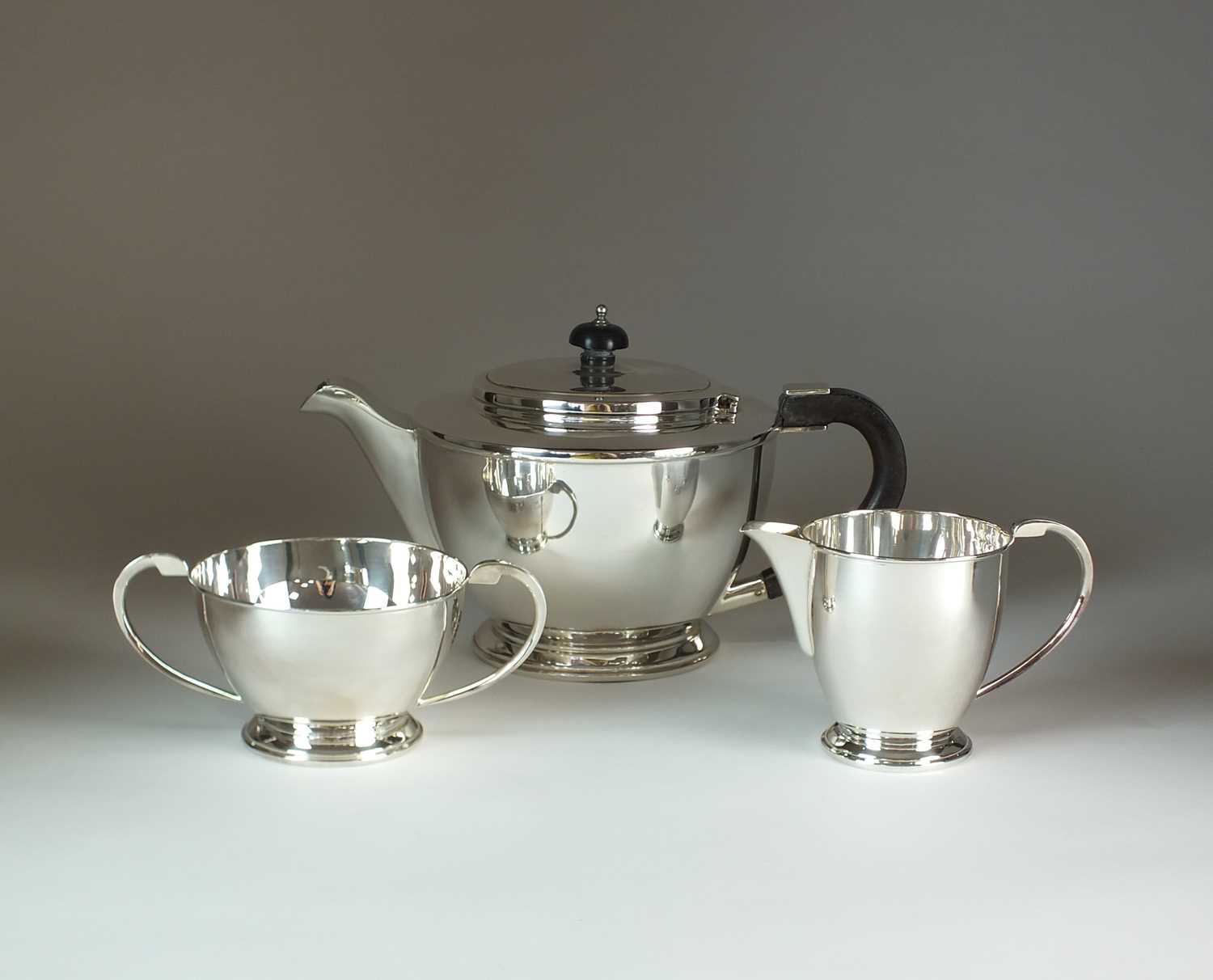 A three piece silver tea service