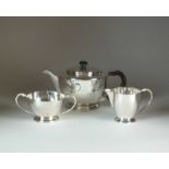 A three piece silver tea service