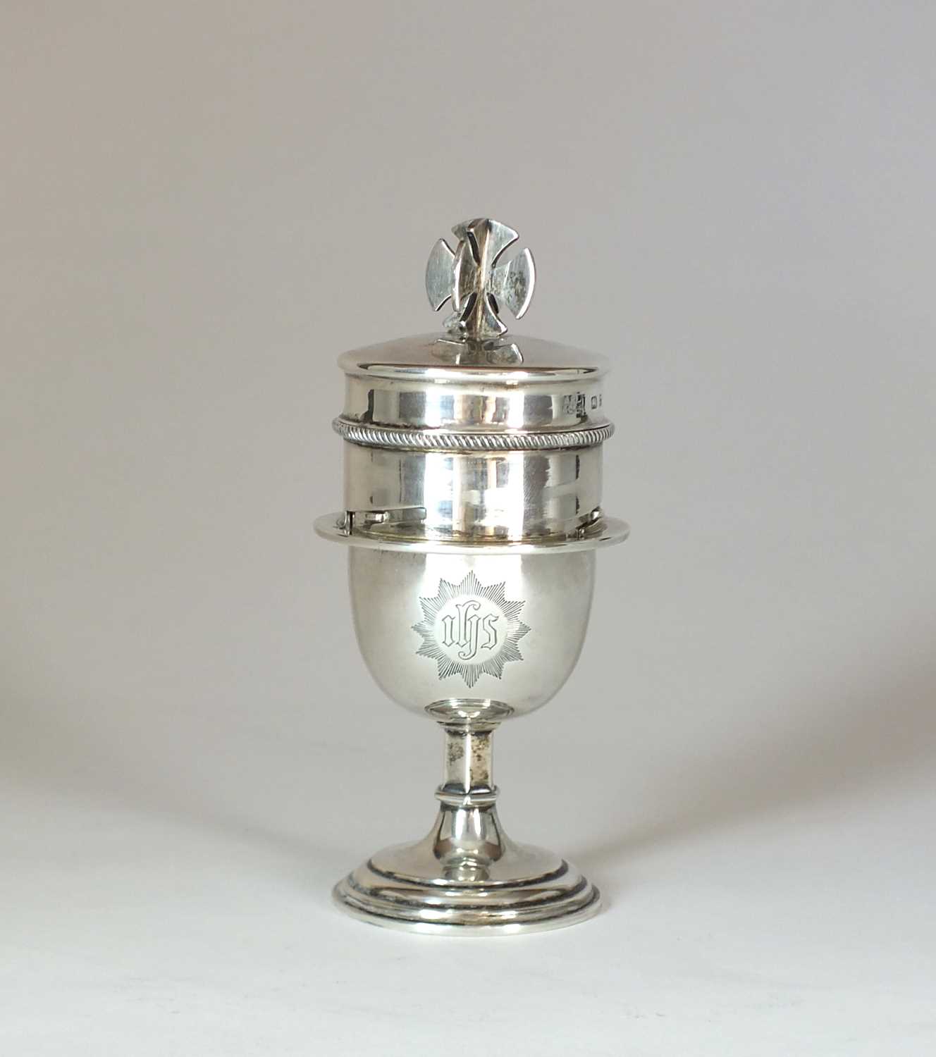 A silver travelling communion set