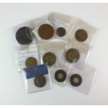 A collection of silver, copper and base metal 19th and 20th century tokens