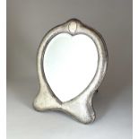 An Edwardian silver mounted heart shaped mirror