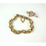 An early 20th century turquoise and seed pearl bracelet and a bar brooch