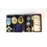 A collection of cased silver, silver gilt, gilt metal and polychrome enamel Masonic medals