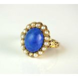 A late 19th century 18ct gold lapis lazuli and split seed pearl cluster ring