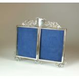 A silver plated double photograph frame