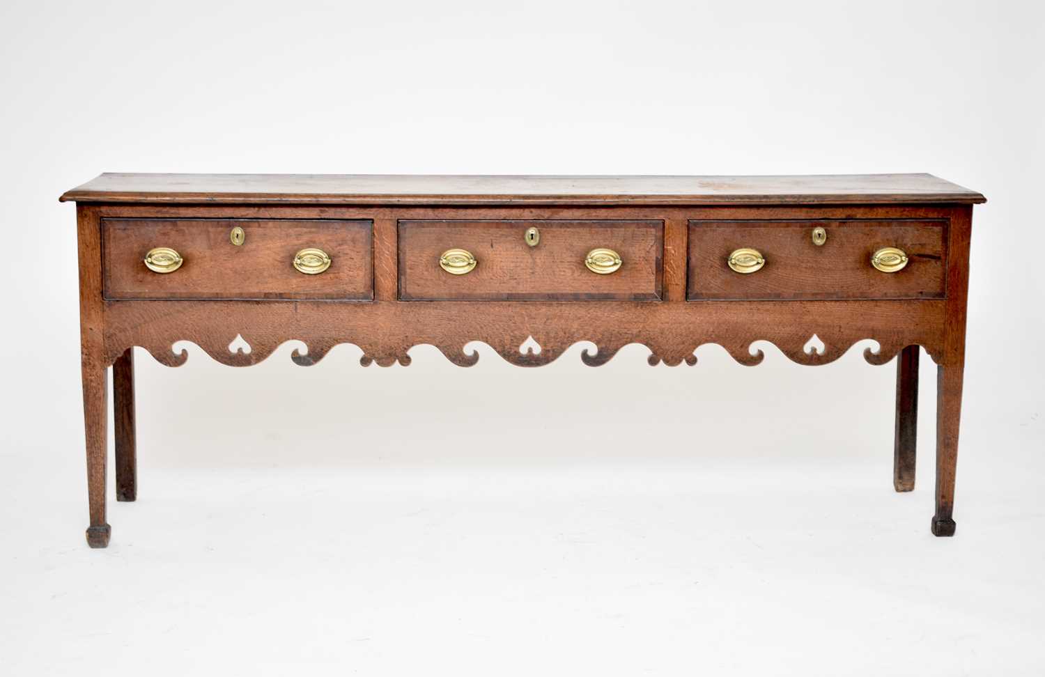 An 18th Century oak and mahogany crossbanded dresser base, West Midlands