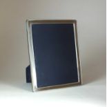 A large silver mounted photograph frame