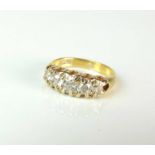 A late 19th century graduated five stone old mine cut diamond ring