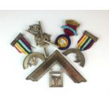 A collection of silver, silver gilt, gilt metal and polychrome enamel Masonic medals