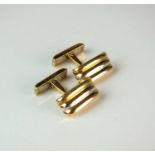 A pair of 18ct tri-coloured gold cufflinks