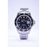 Rolex: A gentleman's stainless submariner wristwatch