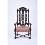 A William and Mary carved walnut open armchair