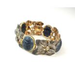 A white and yellow metal bracelet by M. Buccellati