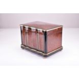 A parcel ebonised and gilt brass amboyna wood cigar casket