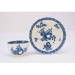 Caughley 'Apple and Damsons' fluted tea bowl and saucer, circa 1780-85