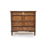 A Jacobean oak chest of four drawers