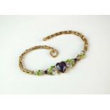 An early 20th century amethyst, seed pearl and green enamel bracelet in the Suffragette colours