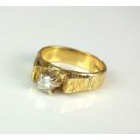 An 18ct gold single stone diamond ring