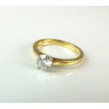 An 18ct gold single stone diamond ring