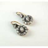 A pair of early 20th century diamond cluster earrings
