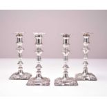 A set of four early Victorian silver candlesticks