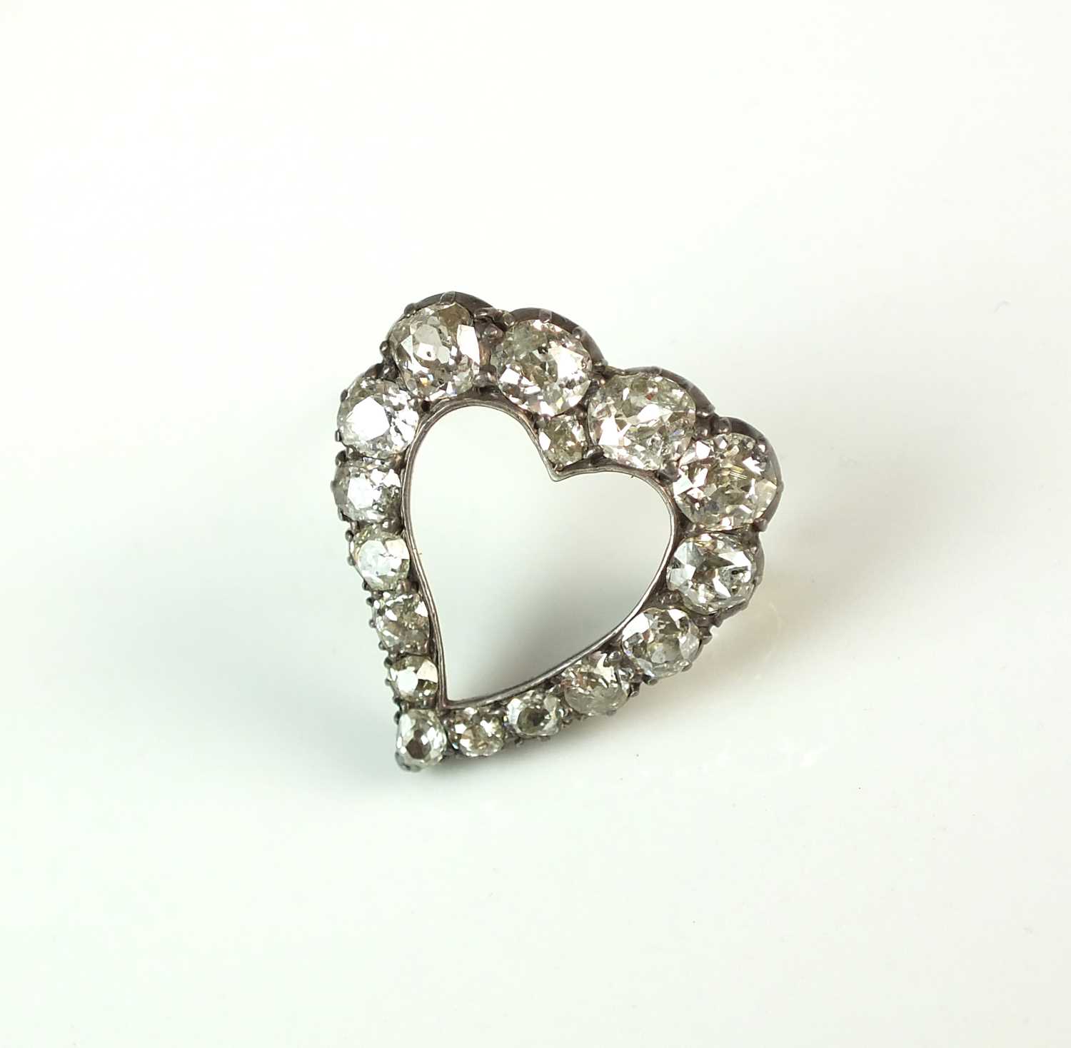 A late 19th century old cut diamond Witches heart brooch