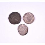 Three hammered coins
