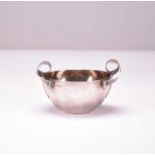An Arts and Crafts silver bowl by W G Connell