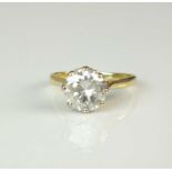 An 18ct gold single stone brilliant cut diamond ring