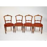 A set of six Edwardian inlaid rosewood dining chairs