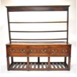 A George III oak dresser and rack