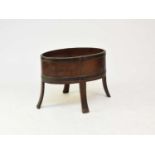 A 19th century coopered mahogany jardiniere