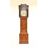 A 19th century inlaid oak painted dial longcase clock