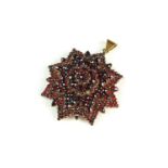 A late 19th century Bohemian garnet cluster pendant