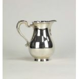 A Goldsmiths & Silversmiths Co Ltd silver baluster jug