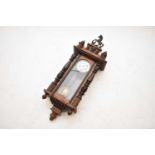 A rosewood veneered Vienna wall clock