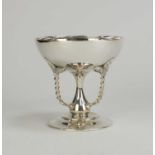 A silver pedestal bowl