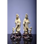 A near pair of Chinese carved soapstone figures of Guanyin